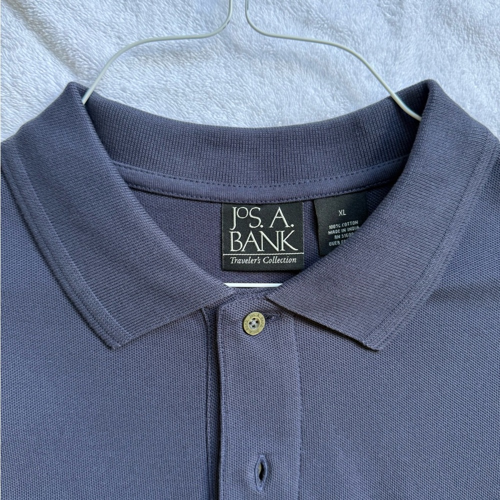 Jos A Banks shirt sleeve polo.   Navy.  XL